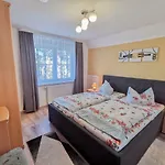 Апартаменты Gaestehaus Heuer